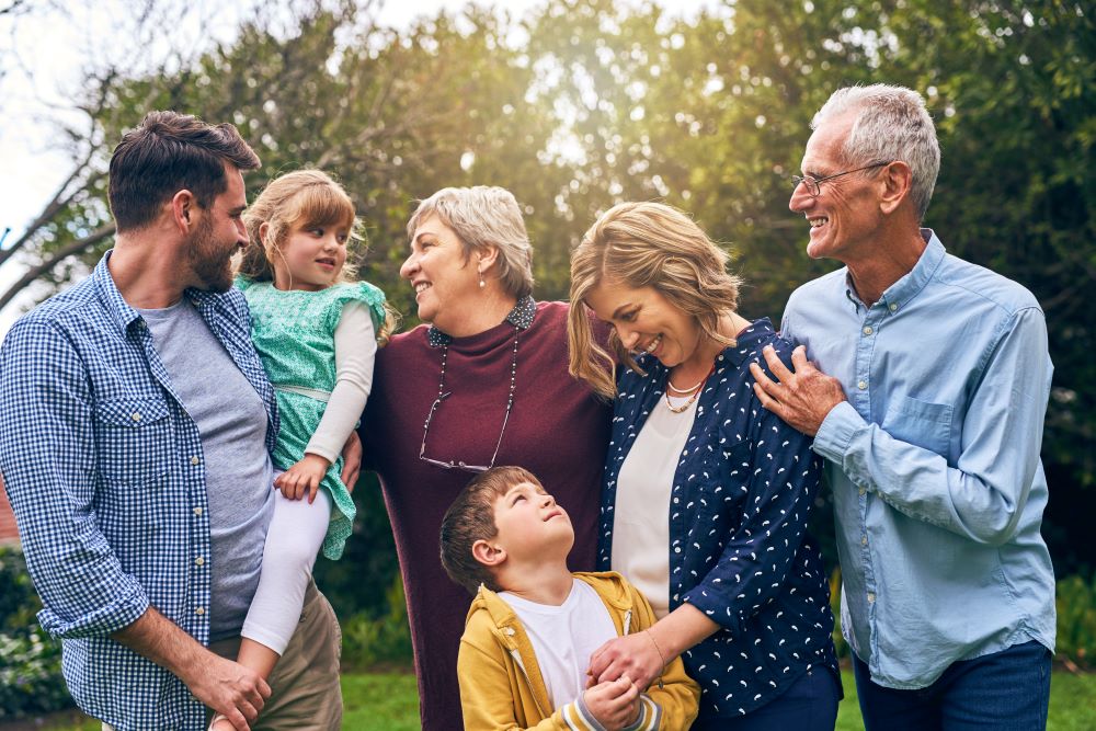 Shot of a multigenerational family outside.